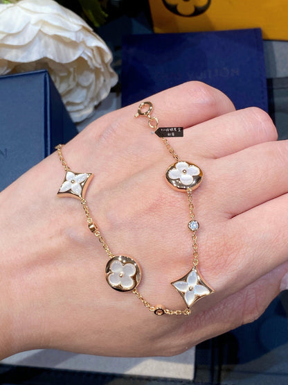 [BloomBling]STAR AND SUN 4 MOTIF WHITE MOP PINK GOLD BRACELET